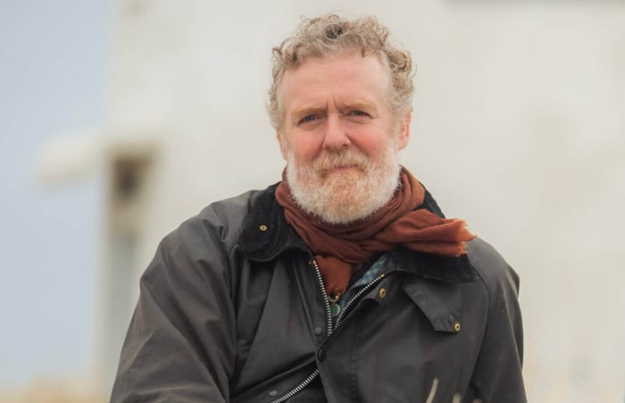 Glen Hansard performing on stage
